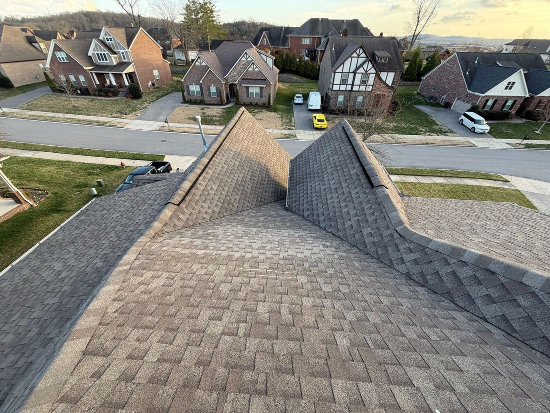 New architectural shingle roof photographed from the ridge, looking over the neighborhood in Middle Tennessee